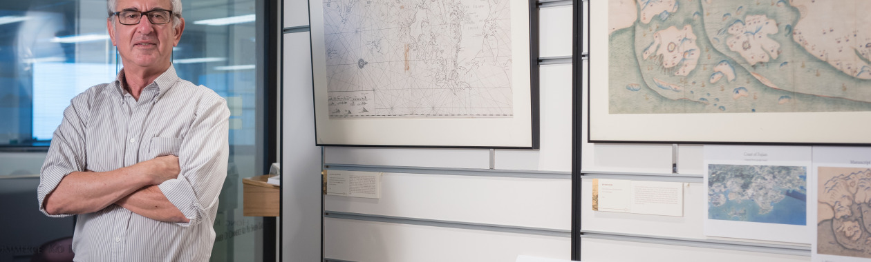Boni looking at maps